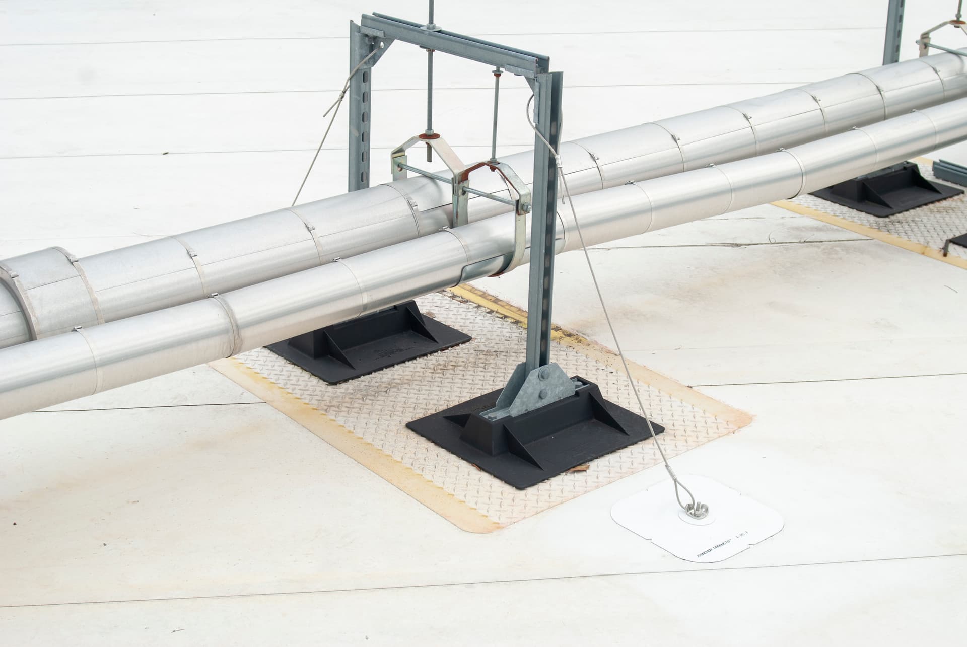 Insulated pipe runs on Compression-Free™ supports